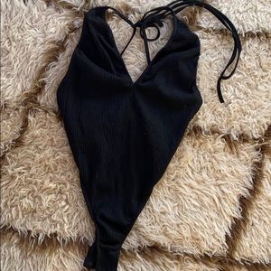 Black low plunge body suit